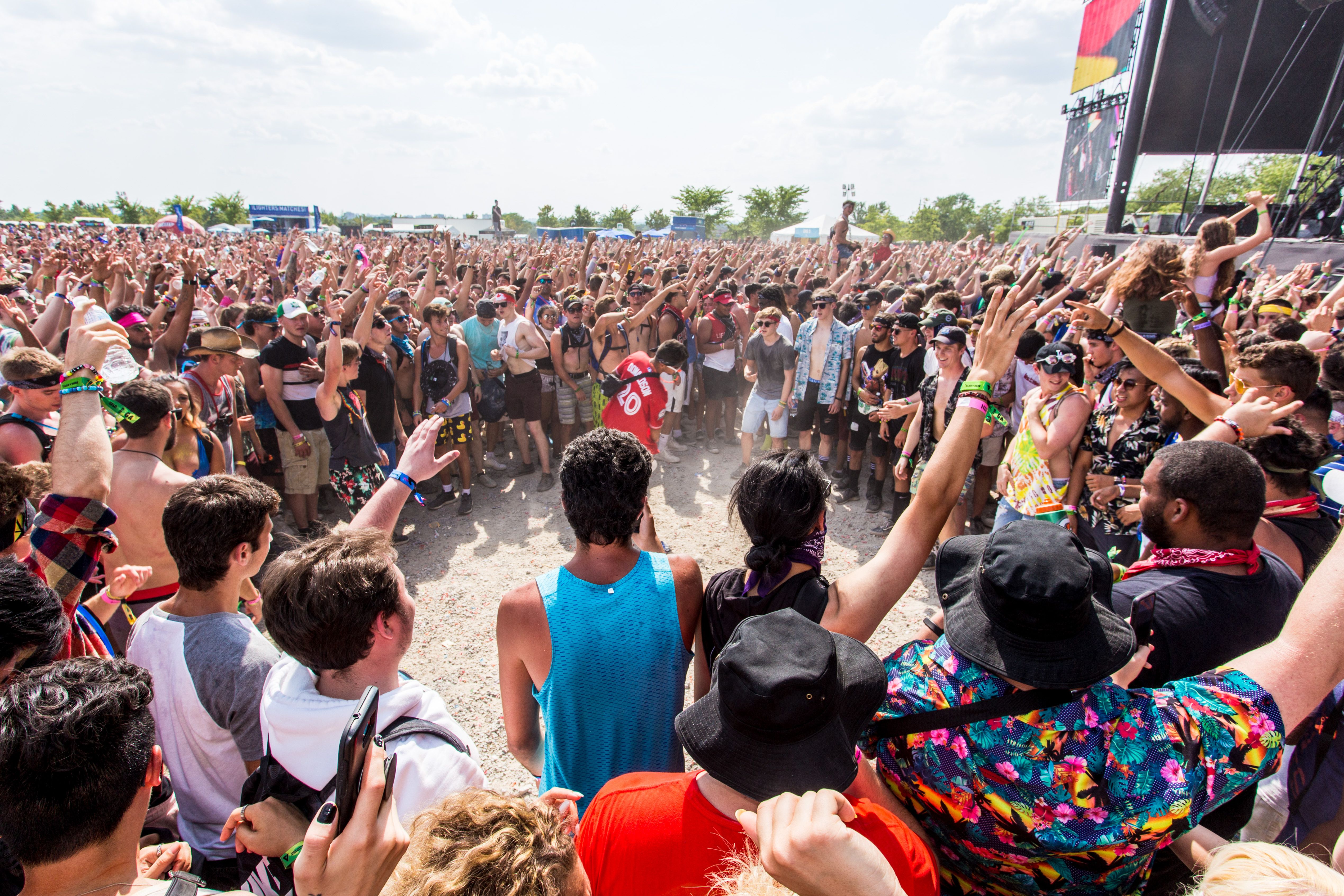 Crowd gathered outdoors for a live concert