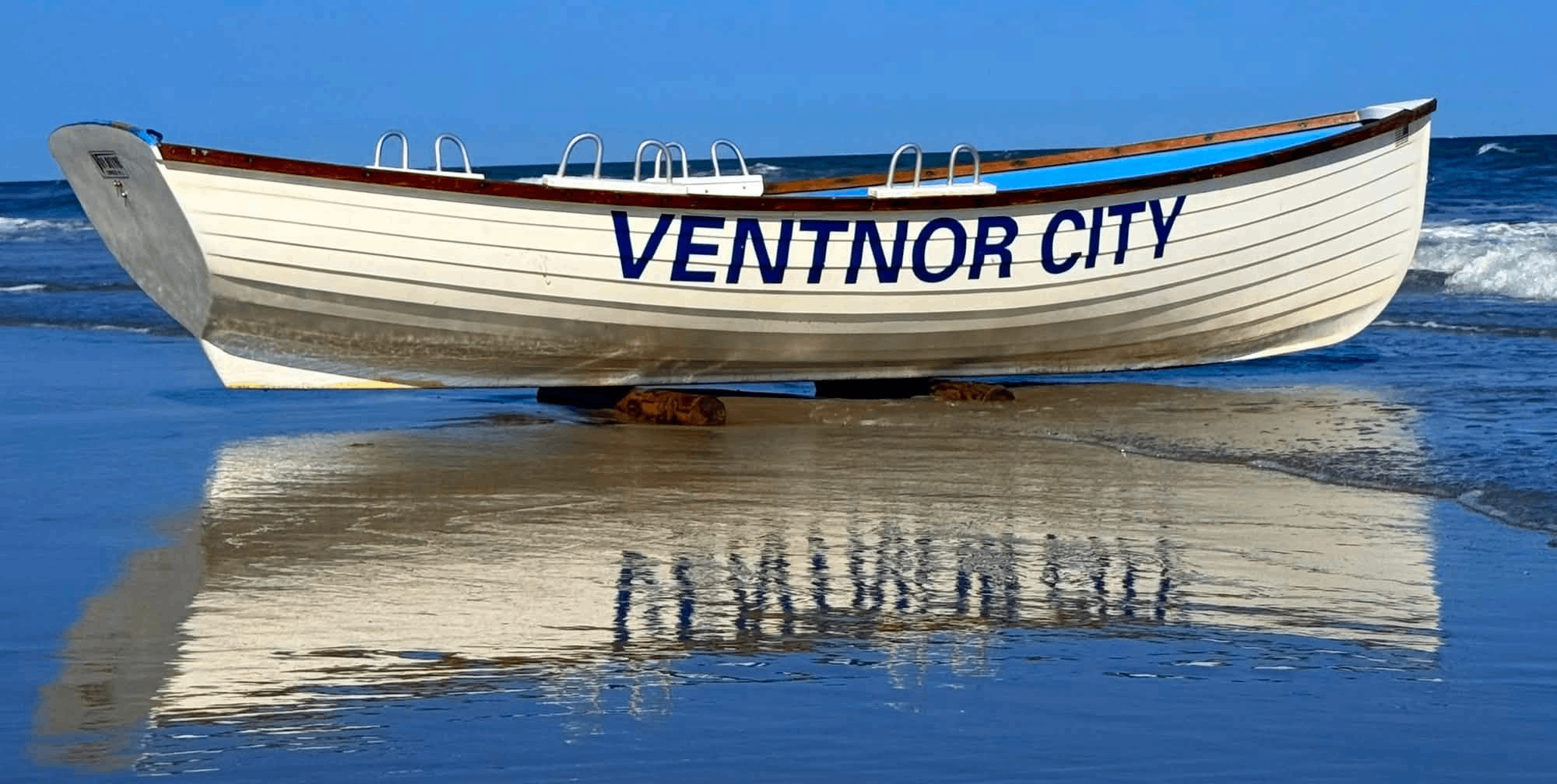 A boat on the water in Ventnor City