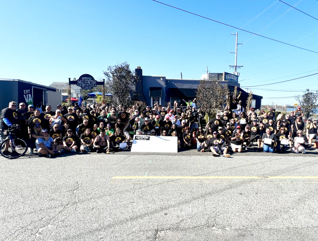 Hundreds of Vagabike 2025 riders gathered for a group photo outside Vagabond Kitchen and Tap House in Chelsea Heights